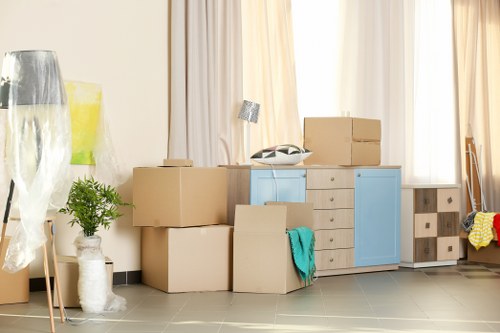Students packing boxes for removals in Kentishtown