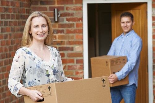 Professional house removals in Kentishtown with moving van and packed boxes