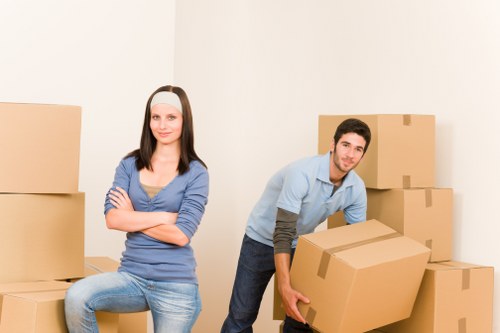 Careful packing and wrapping of fragile items for Kentishtown flat relocation