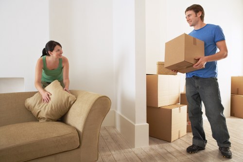 Piano movers planning access routes in a Kentishtown property