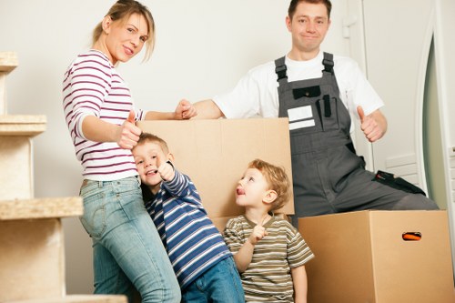 Loading boxes into a moving truck in Kentishtown